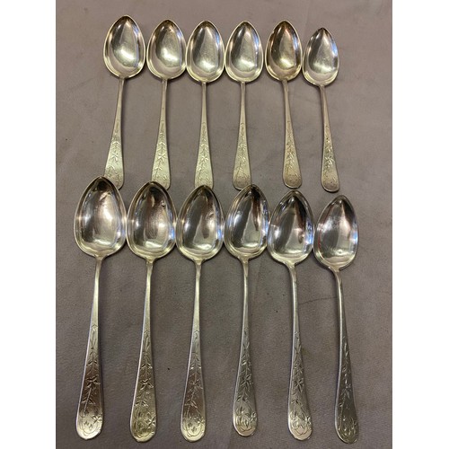 179 - A set of twelve Norwegian silver dessert spoons with engraved leaf decoration by A Westerbom