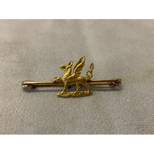 224 - A gold coloured metal bar brooch set seed pearls and a gold coloured metal regimental bar brooch, th... 