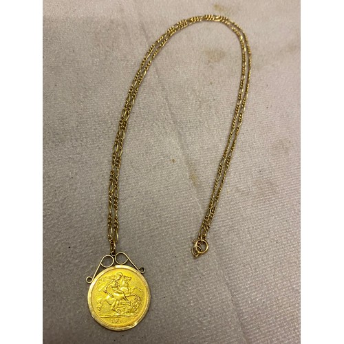 211 - A gold half sovereign for 1982 mounted in a 9ct. gold frame as a pendant, on a 9k. gold chain