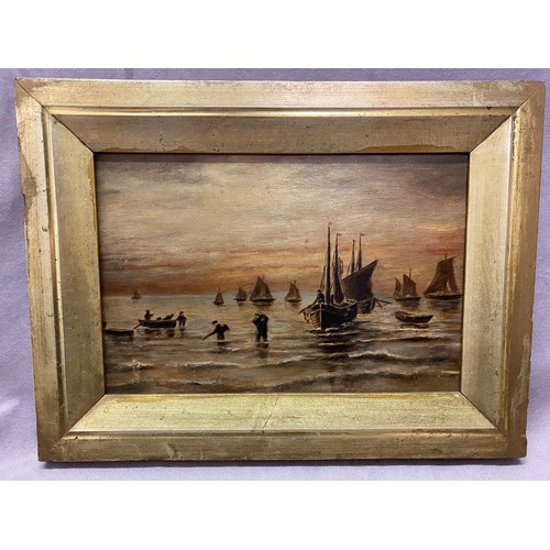 7 - A small signed oil on canvas - Beach scene with fishermen and fishing boats, gilt framed - 5 1/2in. ... 