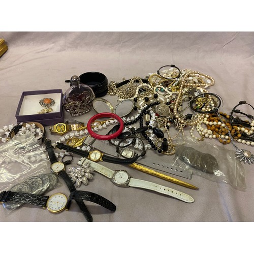 247 - A selection of costume jewellery including dress watches, necklaces, simulated pearls, earrings, ban... 