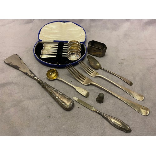 156 - A Georgian silver table fork, a Georgian silver dessert fork, a Victorian silver cruet spoon, a Geor... 