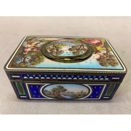 274 - A Continental singing bird box with all over enamel decoration of figures in landcapes, the sides in... 