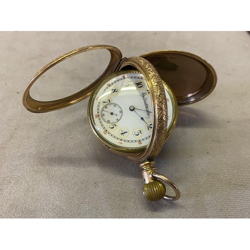 201 - A gentleman's Elgin pocket watch, white enamel dial, seconds dial, on a gimbal, in a gold plated cas... 