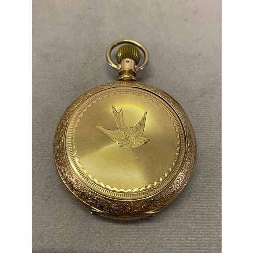 201 - A gentleman's Elgin pocket watch, white enamel dial, seconds dial, on a gimbal, in a gold plated cas... 