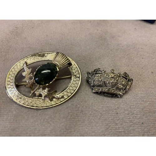 240 - A Scottish silver brooch set green agate and a marcasite brooch in the form of a coronet