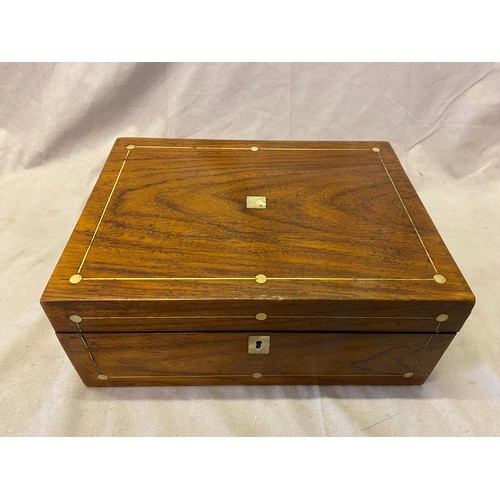 294 - A Victorian rosewood and brass inlaid sewing box, the interior with removable tray