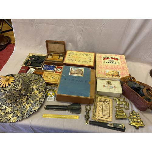 296 - A selection of playing cards, boxes, binoculars, cigarette lighter, brass letter rack, two brass doo... 