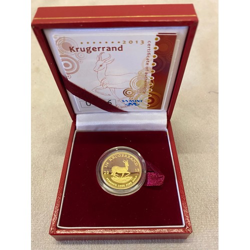 255 - A 2013 1/4 proof Krugerrand with certificate in fitted red leather box