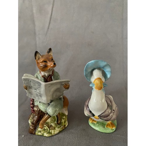 125 - A Beswick Beatrix Potter figure - Jemima Puddleduck and a Royal Albert Beatrix Potter figure - Foxy ... 