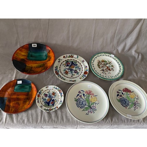 100 - A modern Poole Pottery conical shaped dish, a Poole pottery plate painted flowers etc..