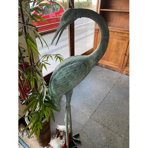 94 - Four bronze garden statues of storks (all af)