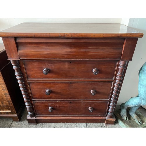 35 - A Victorian mahogany veneered chest, the frieze drawer with roll front above three drawers, turned w... 