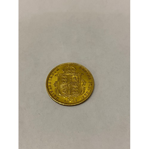 265 - A Victorian gold half sovereign dated 1887 with shield back

Please note buyers premium does not app... 