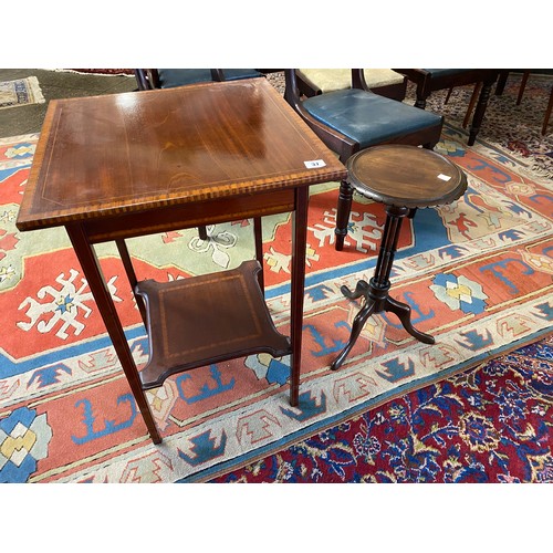 37 - An Edwardian mahogany and satinwood crossbanded table with square top, on square legs united by unde... 