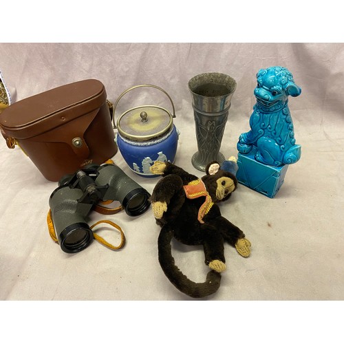 304 - An Art Nouveau style pewter vase, a Chinese blue glazed Dog Of Fo, a vintage plush toy monkey, a pai... 