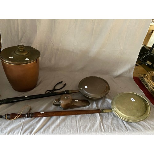 306 - A copper warming pan with turned wood handle, a brass ditto, a copper lidded bin, a copper slipper w... 