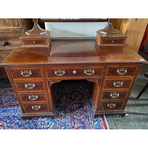 64 - An Edwardian mahogany and satinwood inlaid pedestal dressing table fitted swing mirror, two jewel dr... 