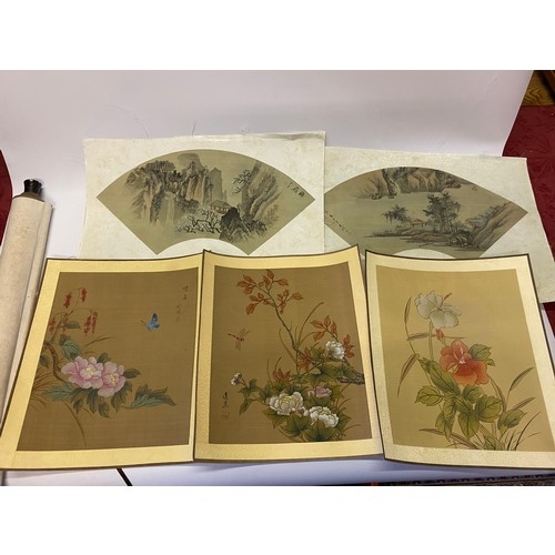 31 - Two Chinese fan shaped prints on fabric, a set of four Chinese prints on fabric decorated flowers an... 