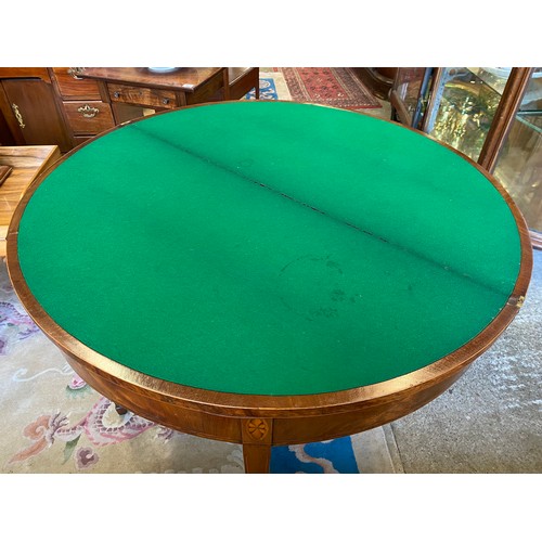 61 - A Georgian mahogany and crossbanded card table, half round folding top enclosing green baize lined i... 