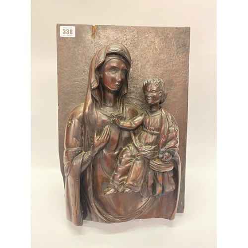 338 - A carved wood plaque depicting Madonna and Child - 16in. x 10in.