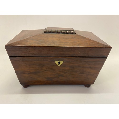 1326 - A 19th Century rosewood sarcophagus shaped tea caddy, on pill feet - 8 1/2in. wide