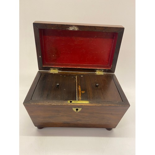 1326 - A 19th Century rosewood sarcophagus shaped tea caddy, on pill feet - 8 1/2in. wide