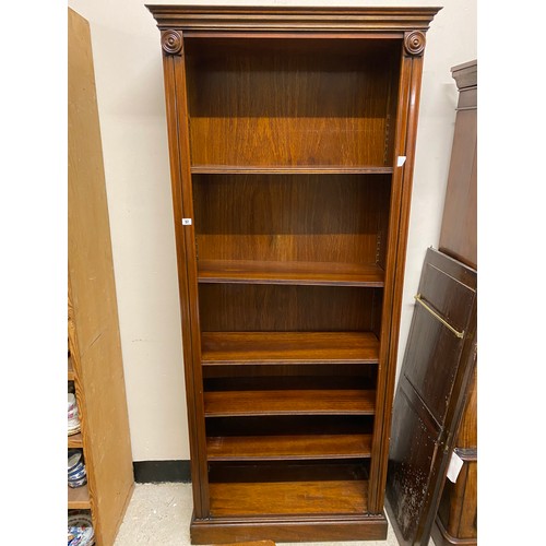 1056 - A reproduction mahogany Regency style bookcase - 33in. wide