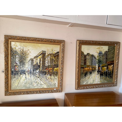 1015 - Sita. A pair of signed oil on canvas - Paris street scenes, framed - 31in. square