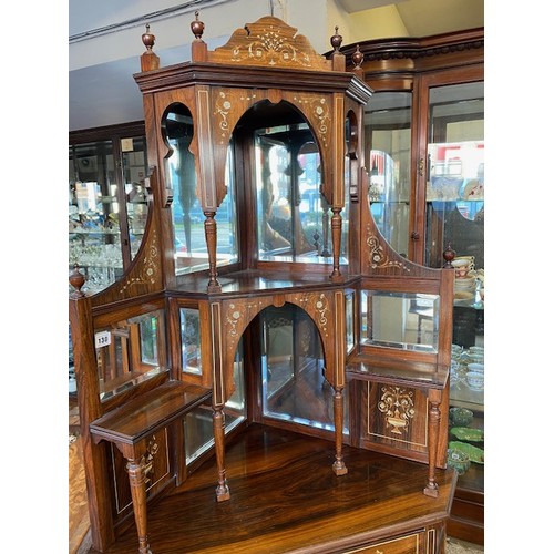 1128 - An Edwardian rosewood and inlaid floor standing angle cabinet, the upper part with shaped pediment, ... 