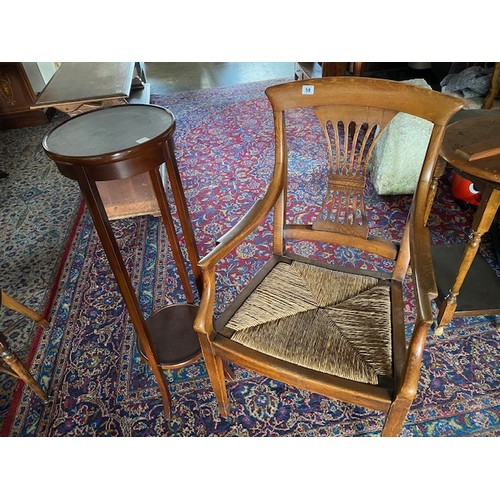 1057 - An oak framed chair with shaped back, pierced centre splat  rush seat and an Edwardian mahogany and ... 