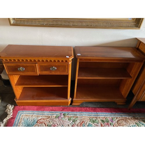 1042 - A reproduction yewwood open front bookcase fitted two drawers, shelves under - 30in. wide and one ot... 