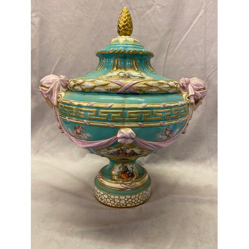 120 - A Berlin porcelain covered urn form vase, turquoise ground with gilt fir cone finial, painted figure... 