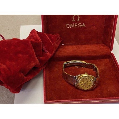 213 - A lady's Omega Seamaster automatic wristwatch in a gold plated case, on a gold plated Omega bracelet... 