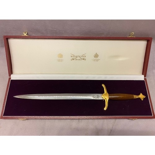 321 - A Wilkinson Sword miniature sword to commemorate D Day, in fitted leather box