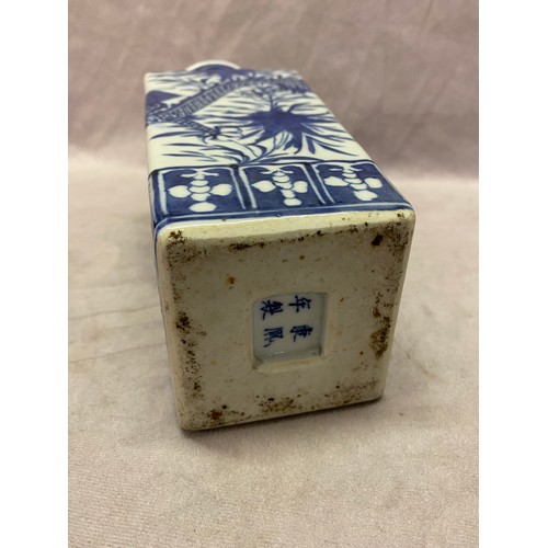 139 - A Chinese porcelain blue and white vase of square section decorated two coiling dragons amongst flow... 