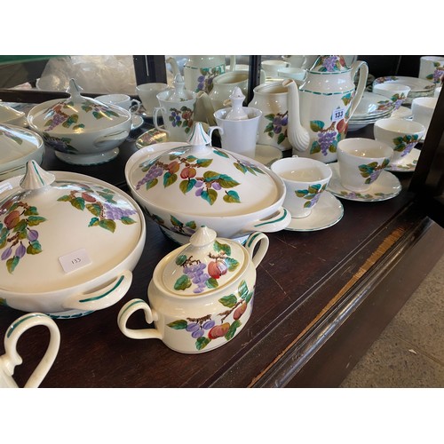 133 - A Rossvar Welsh hand painted dinner and tea service decorated fruit and leaves