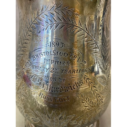 166 - A Victorian silver baluster form tankard with acanthus leaf clad handle, engraved fern leaf decorati... 