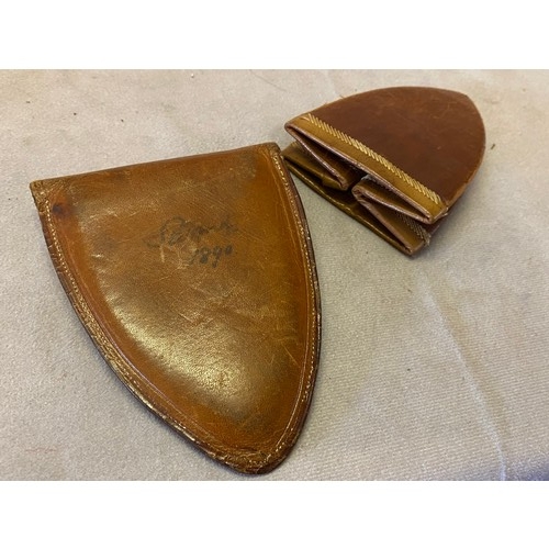 297 - A late 19th Century brown leather folding cup in fitted shield shaped leather holder