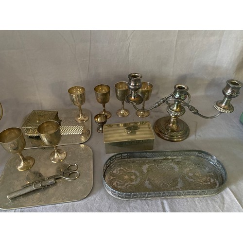 155 - A selection of silver plated items including a set of six goblets, twin branch candelabra, rectangul... 