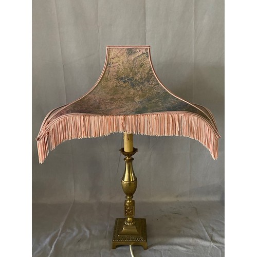 33 - A brass tablelamp base with panelled column, a brass tablelamp base of urn form and one other