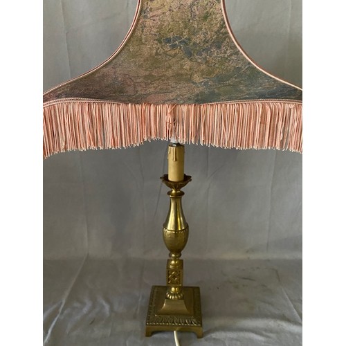 33 - A brass tablelamp base with panelled column, a brass tablelamp base of urn form and one other