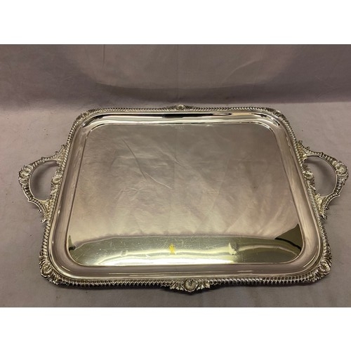 187 - A large rectangular silver double handled tray with gadroon and shell pattern border - Sheffield 190... 