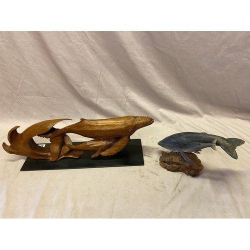 314 - A carved wood model of a Humpback Mother Whale and Calf by John Mainwaring - 7in. high and a carved ... 