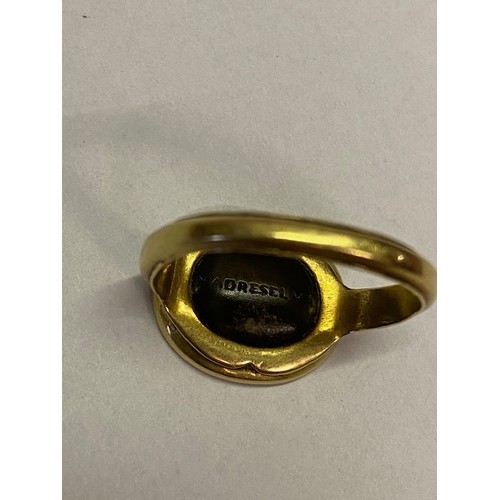 273 - A Georgian gold ring, the top set with hardstone seal, the shank dated June 7th 1814