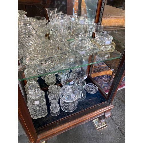 146 - A selection of glassware including flutes, rummers, stands, decanters, plate with wrythen decoration... 