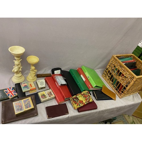 280 - Two resin flower arranging stands with figural surmounts, two wicker boxes and a small wicker hamper... 