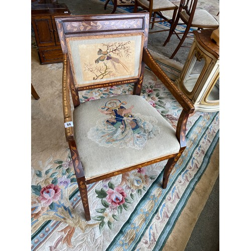 56 - An antique Dutch marquetry armchair with upholstered seat and back pad, on sabre legs