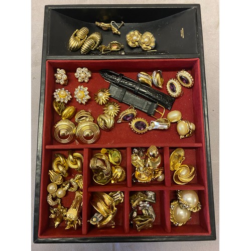 290 - A large collection of clip on earrings including Burberry