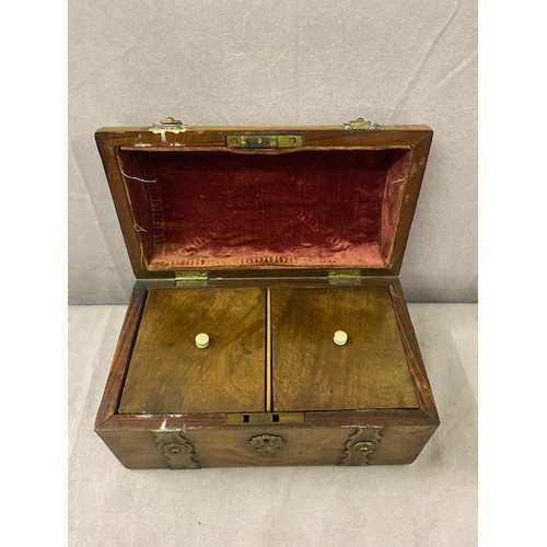 343 - A Victorian walnut casket with dome shaped top, brass strapwork decoration